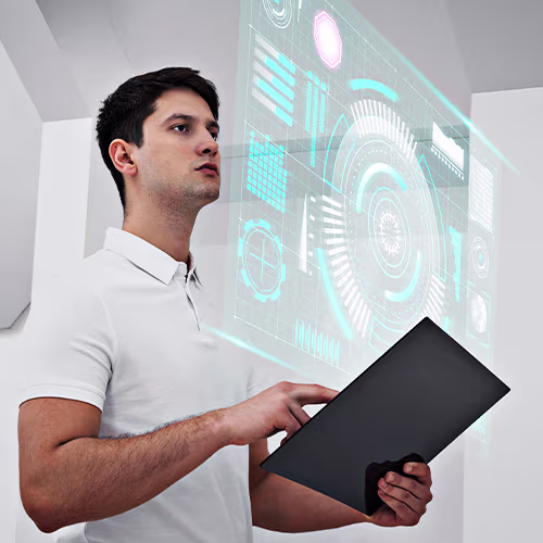 Young man holding a tablet. Graphic elements in the background